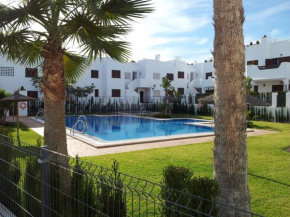 Homes of Spain, Mar de Pulpi fase 1, Apartamento primera linea de playa, bajo con jardin y WIFI